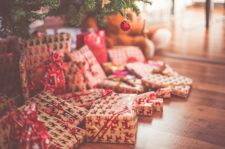 Christmas presents under a tree.